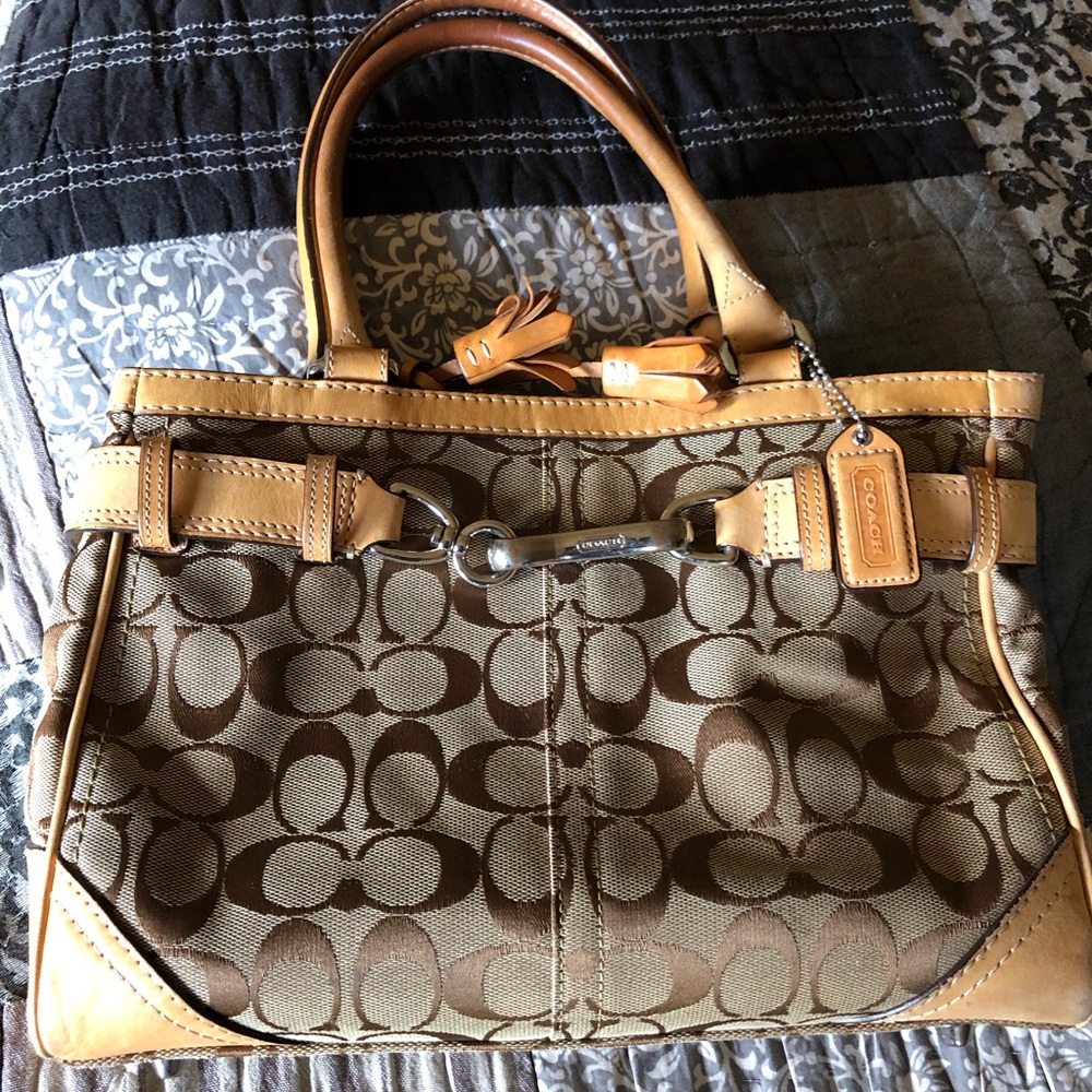 Coach medium sized tan, leather and cloth handbag